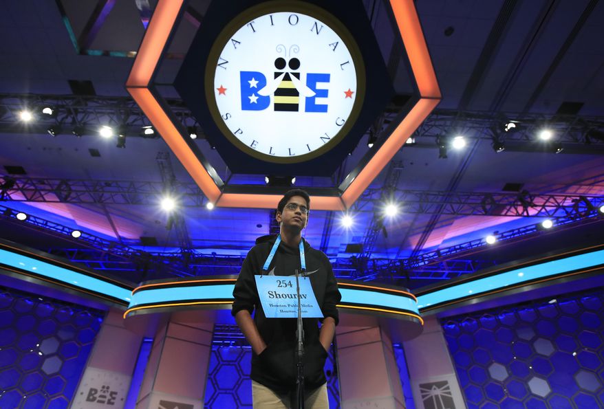 FILE - In this June 1, 2017 file photo, Shourav Dasari, 14, from Spring, Texas, correctly spells his word during the finals of the 90th Scripps National Spelling Bee, in Oxon Hill, Md. With the 2020 Scripps National Spelling Bee canceled because the coronavirus pandemic, an online spelling bee launched by two Texas teenagers is offering a consolation prize of sorts, with competitors nationwide including many of the kids who were considered favorites for the Scripps title.(AP Photo/Manuel Balce Ceneta, File)