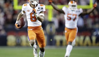 FILE - In this Jan. 7, 2019, file photo, Clemson&#39;s A.J. Terrell intercepts a pass for a touchdown during the first half the NCAA college football playoff championship game against Alabama in Santa Clara, Calif. Terrell was chosen by the Atlanta Falcons in the first round of the NFL draft. (AP Photo/Ben Margot, File)