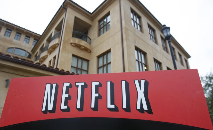 FILE - This Jan. 29, 2010, file photo, shows the company logo and view of Netflix headquarters in Los Gatos, Calif. COVID-19 may have knocked U.S. stocks into a bear market and pummeled the U.S. economy, but the disease has also left some companies asking the question: “What recession?” (AP Photo/Marcio Jose Sanchez, File)
