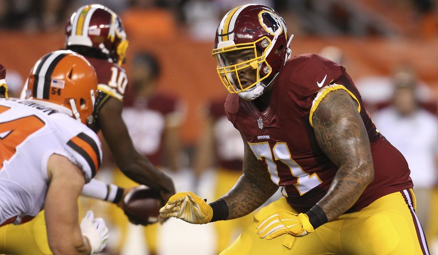 In this Aug. 13, 2015, file photo, Washington Redskins tackle Trent Williams (71) blocks Cleveland Browns linebacker Scott Solomon (54) during an NFL preseason football game in Cleveland. The San Francisco 49ers have acquired the seven-time Pro Bowl left tackle from the Redskins. Two people familiar with the deal said Saturday, April 25, 2020,  the Niners will send a fifth-round pick in this year’s draft and a 2021 third-rounder to acquire Williams.  (AP Photo/Ron Schwane) ** FILE **