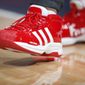 FILE - In this file photo dated Wednesday, Dec. 25, 2019, New Orleans Pelicans forward Derrick Favors wears Christmas-themed Adidas Pro Model Superstars shoes in the first half of an NBA basketball game Wednesday, Dec. 25, 2019, in Denver, USA.  Sports apparel and shoe company Adidas said Tuesday April 14, 2020, it has been approved by the German government for a 3 billion-euro ( US dollars 3.3 billion) emergency loan to help the company get through a period of lost business due to the COVID-19 coronavirus outbreak. (AP Photo/David Zalubowski, FILE)