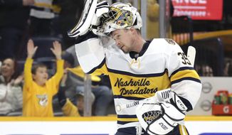 FILE - In this Feb. 16, 2020, file photo, Nashville Predators goaltender Pekka Rinne, of Finland, skates back to the net during the third period of the team&#39;s NHL hockey game against the St. Louis Blues in Nashville, Tenn. The NHL&#39;s pause has the clock ticking on the career of a former Vezina Trophy winner and four-time finalist with Rinne turning 38 in November. (AP Photo/Mark Humphrey, File)