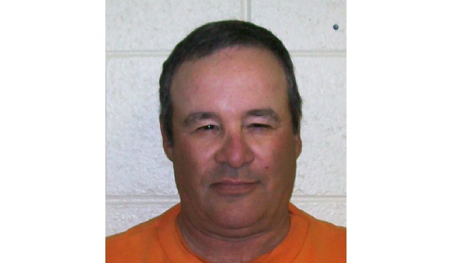 This undated photo provided by the Arizona Department of Corrections shows Joseph M. Assyd, who was sentenced to life in prison for 1995 convictions for murder and kidnapping in Maricopa County. He became the first inmate in Arizona prisons to die from COVID-19. (Arizona Department of Corrections via AP)