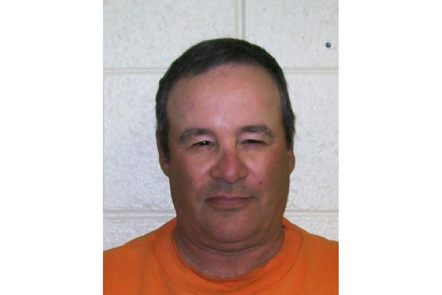 This undated photo provided by the Arizona Department of Corrections shows Joseph M. Assyd, who was sentenced to life in prison for 1995 convictions for murder and kidnapping in Maricopa County. He became the first inmate in Arizona prisons to die from COVID-19. (Arizona Department of Corrections via AP)