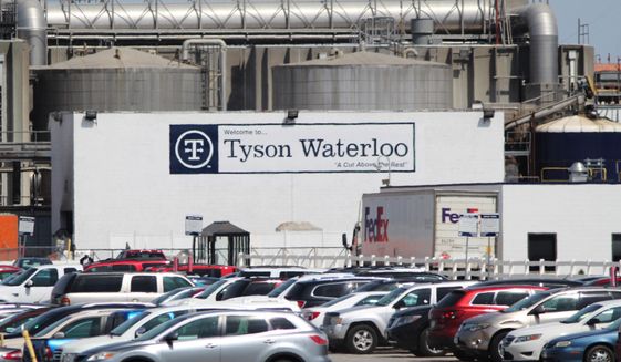 This undated photo shows Tyson Foods meats plant in Waterloo, Iowa. Meat isn&#x27;t going to disappear from supermarket shelves because of outbreaks of the coronavirus among workers at massive slaughterhouses, but there could be less selection and higher prices as plants struggle to stay open. Tyson Foods has suspended operations at the plant, as of Monday, April 27, 2020. (Jeff Reinitz/The Courier via AP) ** FILE **