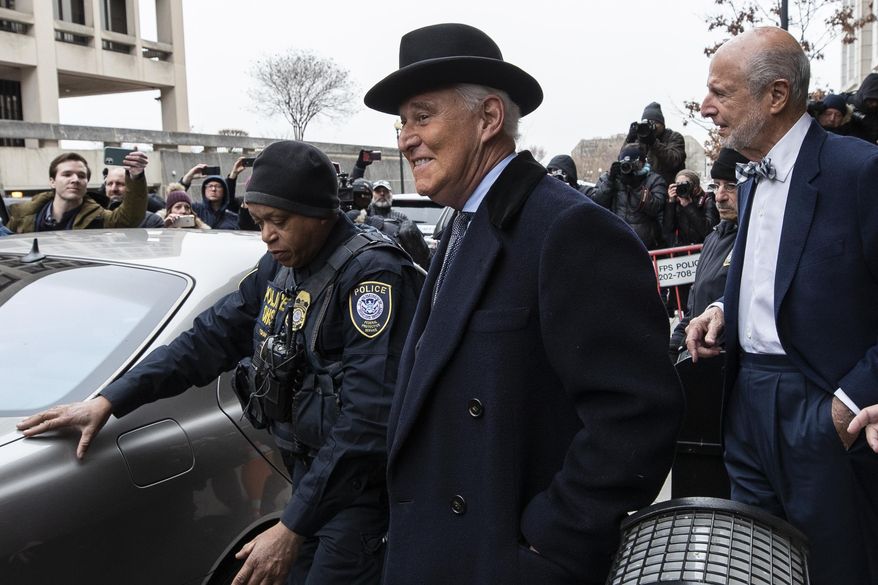 Roger Stone, center, departs federal court in Washington, Thursday, Feb. 20, 2020. (AP Photo/Alex Brandon) ** FILE **