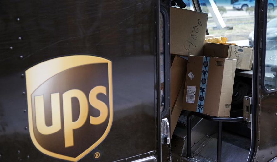 In this Dec. 19, 2018, file photo packages await delivery inside of a UPS truck in Baltimore. UPS said on Sept. 9, 2020, that it plans to hire an additional 100,000 employees this holiday shipping season. (AP Photo/Patrick Semansky, FIle)  **FILE**