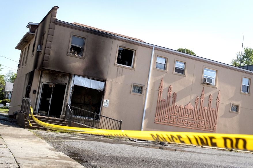 This Friday, April 24, 2020 photo shows damage to the Islamic Center of Cape Girardeau, Mo. after a fire. The FBI is offering a $5,000 reward for information leading to the arrest of anyone connected to a fire that badly damaged the center in southeast Missouri. Fire broke out early Friday at the Islamic Center of Cape Girardeau. About 12 to 15 people were evacuated and escaped injury. (Jacob Wiegand/The Southeast Missourian via AP)