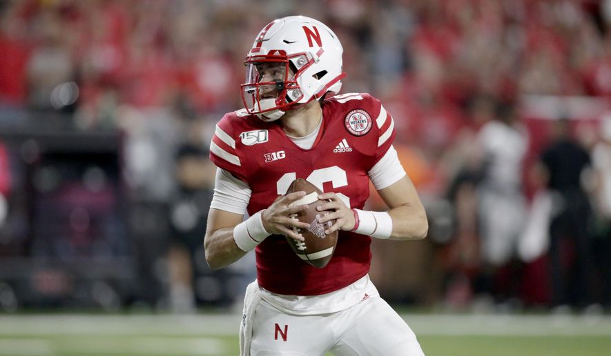 File- In this Sept. 14, 2019 file photo, Nebraska quarterback Noah Vedral (16) looks for a receiver during the second half of an NCAA college football game against Northern Illinois in Lincoln, Neb. Nebraska quarterback Noah Vedral has entered the transfer portal and plans to play his final two seasons at another school, an athletic department spokesman confirmed Tuesday, April 28, 2020. (AP Photo/Nati Harnik, File)