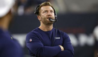 FILE - In this Aug. 29, 2019, file photo, Los Angeles Rams&#x27; Sean McVay looks up at the scoreboard during the first half of a preseason NFL football game against the Houston Texans in Houston. A year ago at this time, the Los Angeles Rams were fresh off a Super Bowl trip and back-to-back NFC West titles. Now they seem to be looking up at the competition in the NFL&#x27;s toughest division. (AP Photo/Kevin M. Cox, File)