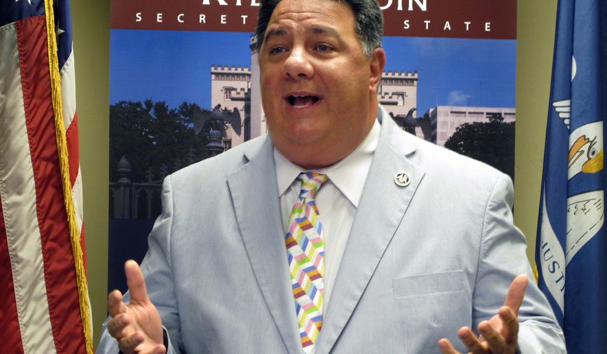 FILE - In this July 20, 2018, file photo, interim Secretary of State Kyle Ardoin, R-Baton Rouge, talks to reporters in Baton Rouge, La. An emergency plan to increase early and mail-in voting options for Louisiana's summer elections because of the coronavirus won approval Wednesday, April 22, 2020, from key state House and Senate oversight panels, but only after the mail-in balloting expansion was scaled back from a prior proposal. Republican lawmakers who raised concerns about voter fraud and stalled the first plan submitted by Ardoin lifted their objections once Ardoin more strictly limited the list of who's eligible for mail-in ballots. (AP Photo/Melinda Deslatte, File)