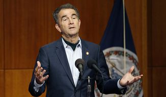 Virginia Gov. Ralph Northam speaks during the COVID-19 update news conference in the Patrick Henry Building Wednesday, April 29, 2020, in Richmond, Va. (Mark Gormus/Richmond Times-Dispatch via AP) ** FILE **