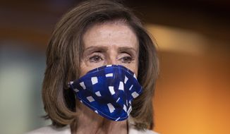 House Speaker Nancy Pelosi of Calif. listens to questions during a news conference on Capitol Hill Thursday, April 30, 2020, in Washington. (AP Photo/Manuel Balce Ceneta)