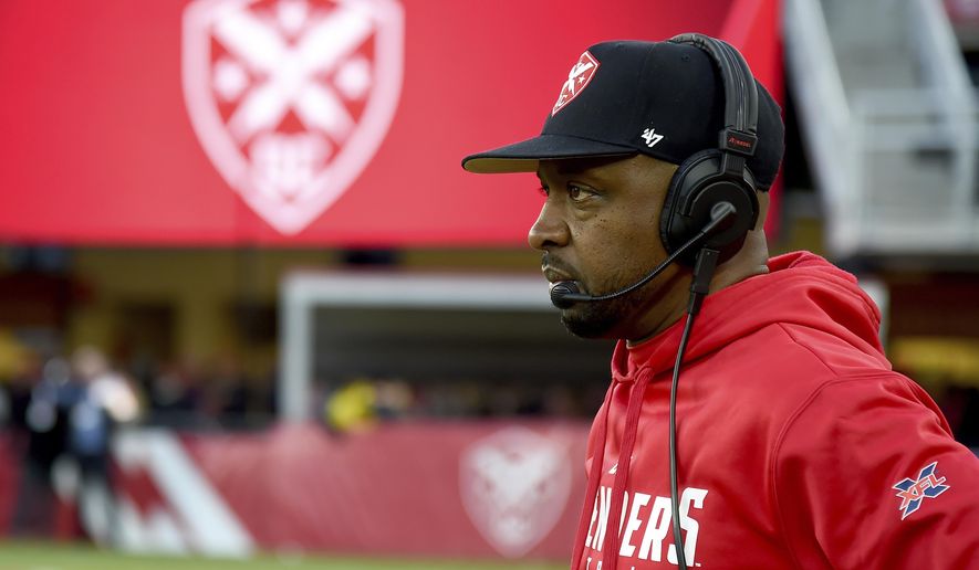 FILE - In this Feb. 8, 2020, file photo, DC Defenders head coach Pep Hamilton looks on during an XFL football game against the Seattle Dragons in Washington. The Los Angeles Chargers are hiring Hamilton as quarterbacks coach, a person familiar with the negotiations told The Associated Press. The person spoke Thursday, April 30, 2020, on condition of anonymity because the deal, first reported by The Athletic, has not been officially announced by the team. (AP Photo/Will Newton, File)