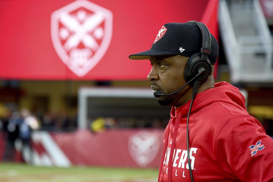 FILE - In this Feb. 8, 2020, file photo, DC Defenders head coach Pep Hamilton looks on during an XFL football game against the Seattle Dragons in Washington. The Los Angeles Chargers are hiring Hamilton as quarterbacks coach, a person familiar with the negotiations told The Associated Press. The person spoke Thursday, April 30, 2020, on condition of anonymity because the deal, first reported by The Athletic, has not been officially announced by the team. (AP Photo/Will Newton, File)