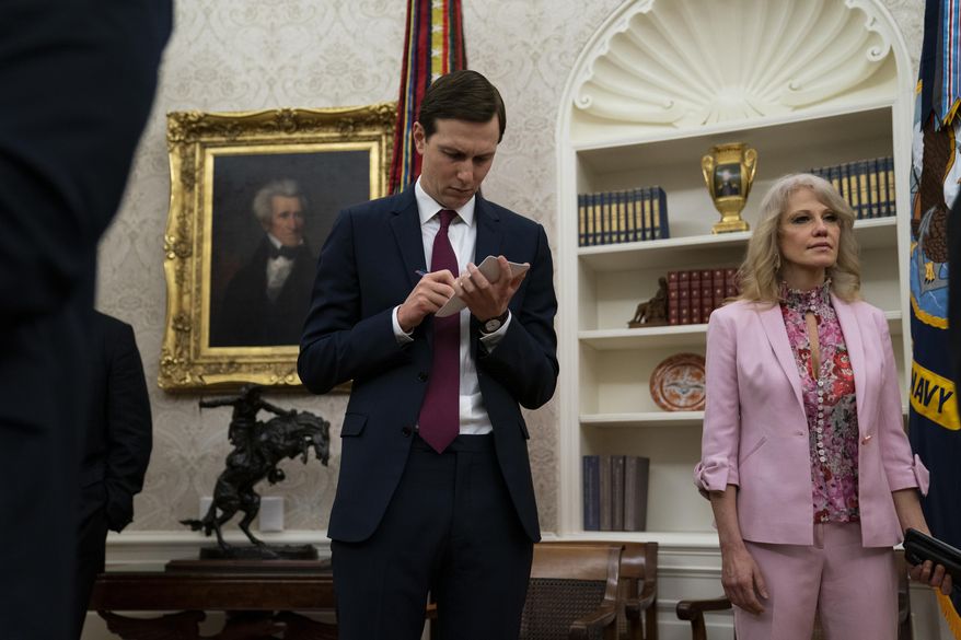White House senior adviser Jared Kushner and White House counselor Kellyanne Conway listen as President Donald Trump speaks during a meeting about the coronavirus response with Gov. Phil Murphy, D-N.J., in the Oval Office of the White House, Thursday, April 30, 2020, in Washington. (AP Photo/Evan Vucci) ** FILE **