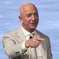 This June 19, 2019, file photo shows Amazon founder Jeff Bezos during the JFK Space Summit at the John F. Kennedy Presidential Library in Boston. (AP Photo/Charles Krupa) ** FILE **
