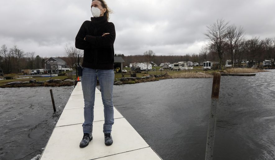 Clayton Park owner Sonya Zacker plans to open her campgrounds along with others across Pennsylvania on Friday but facilities at her park like the pool, fishing dock, laundry, and dog park will remain closed due to the coronavirus outbreak in Lake Ariel, Pa., Thursday, April 30, 2020. (Jake Danna Stevens/The Times-Tribune Via AP)