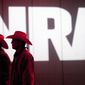 In this May 4, 2013, file photo, National Rifle Association members listen to speakers during the NRA's annual Meetings and Exhibits at the George R. Brown Convention Center in Houston. (Johnny Hanson/Houston Chronicle via AP, File)