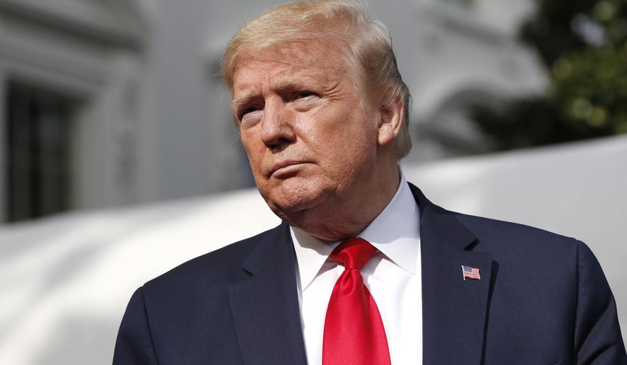 President Donald Trump speaks with reporters as he departs the White House, Friday, May 1, 2020, in Washington, enroute to Camp David, Md.(AP Photo/Alex Brandon)
