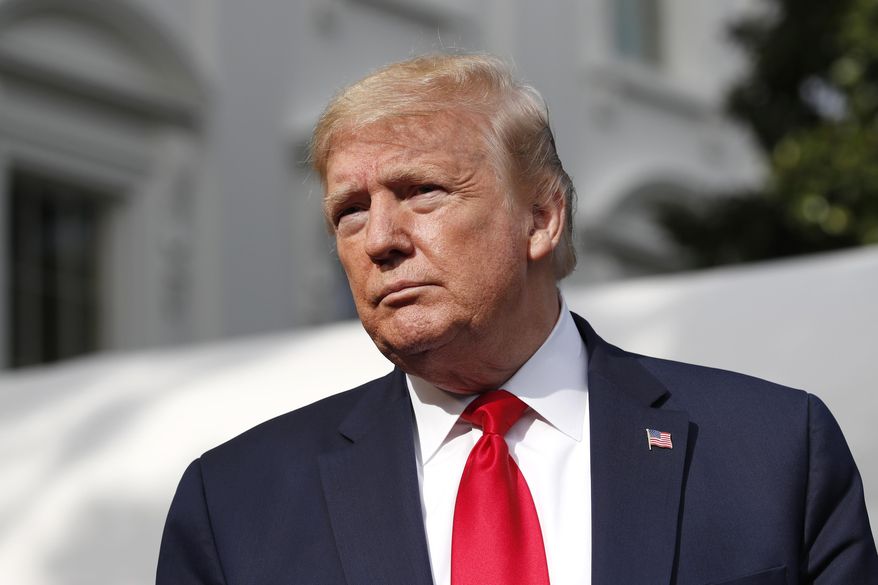 President Donald Trump speaks with reporters as he departs the White House, Friday, May 1, 2020, in Washington, enroute to Camp David, Md.(AP Photo/Alex Brandon)