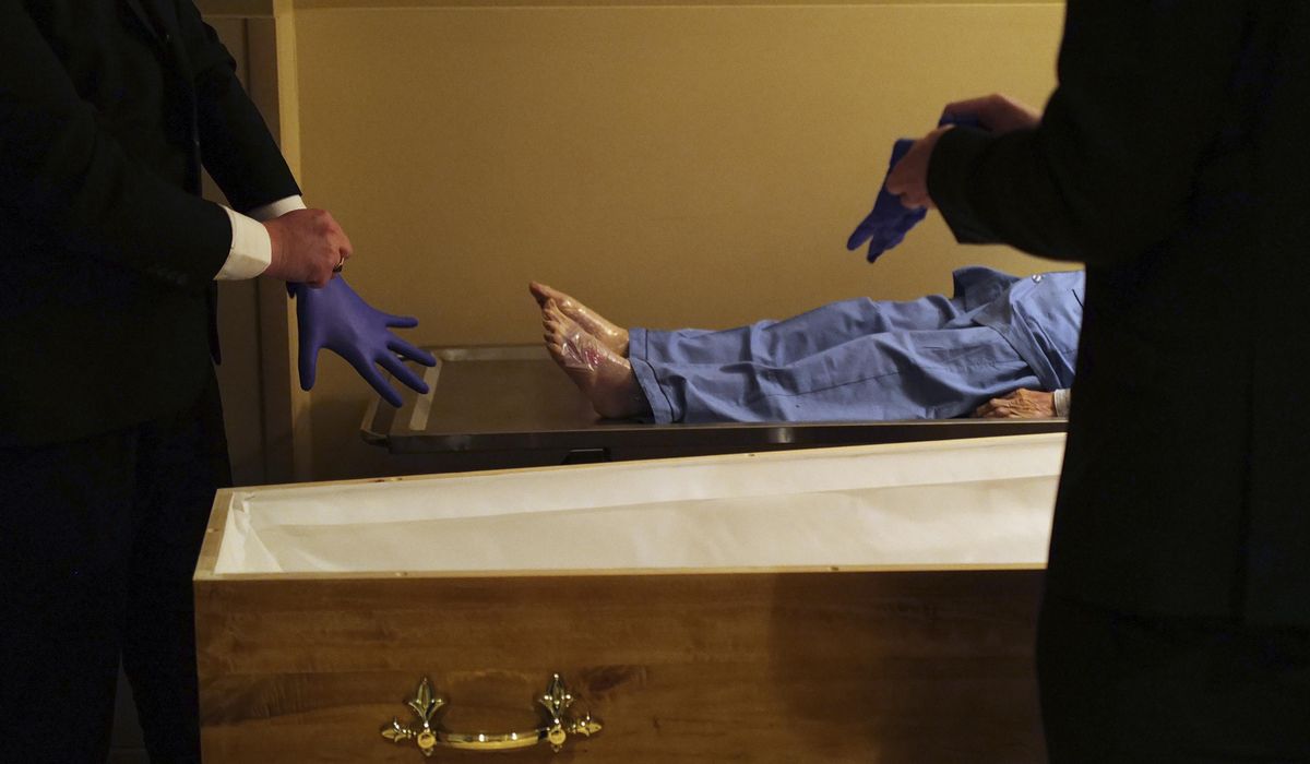 NextImg:‘Dead’ woman wakes up minutes before cremation