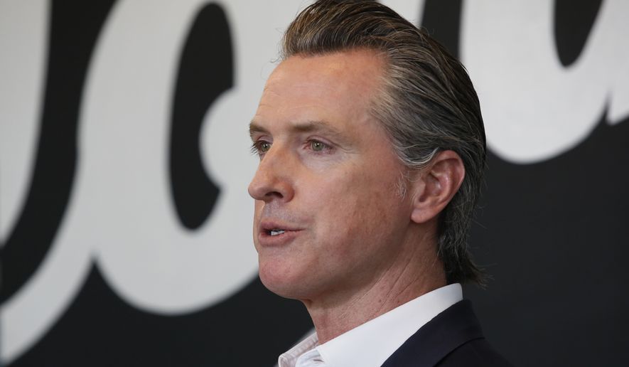 Gov. Gavin Newsom discusses his plan for the gradual reopening of California businesses during a news conference at the Display California store in Sacramento, Calif., Tuesday, May 5, 2020. Gavin Newsom has publicly scolded a pair of rural counties for allowing some businesses to reopen. (AP Photo/Rich Pedroncelli, Pool)