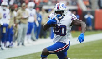 In this Nov. 10, 2019, file photo, Buffalo Bills running back Frank Gore (20) runs the ball against the Cleveland Browns during an NFL game in Cleveland. Running back Frank Gore has agreed to terms on a one-year contract with the New York Jets, agent Drew Rosenhaus announced Tuesday, May 5, 2020. (AP Photo/Rick Osentoski, File) **FILE**