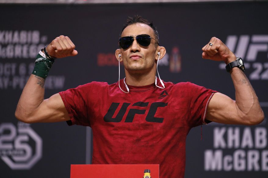 In this Oct. 5, 2018, file photo, Tony Ferguson poses during a ceremonial weigh-in for a UFC 229 mixed martial arts fight in Las Vegas. UFC 249 scheduled for May 9, 2020, at Jacksonville Arena will be headlined by lightweight title contenders Tony Ferguson and Justin Gaethje. (AP Photo/John Locher, File)