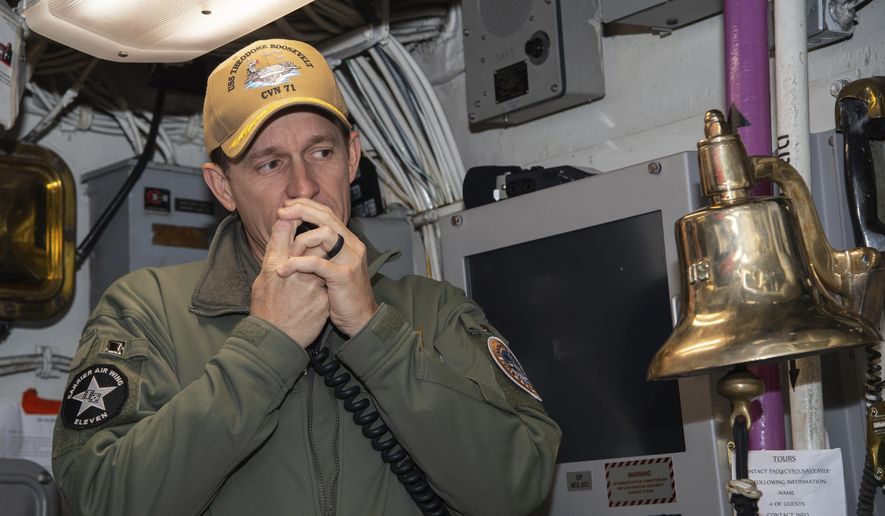 In this image provided by the U.S. Navy, Capt. Brett Crozier, then-commanding officer of the aircraft carrier USS Theodore Roosevelt (CVN 71), addresses the crew on Jan. 17, 2020, in San Diego, Calif. (Mass Communication Specialist Seaman Alexander Williams/U.S. Navy via AP)