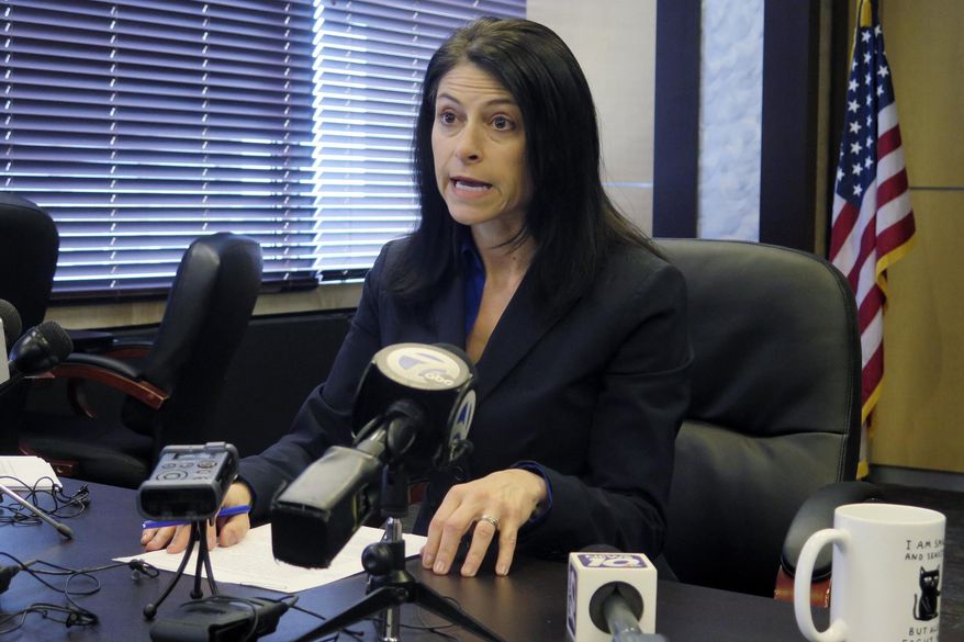 In this March 5, 2020 file photo, Michigan Attorney General Dana Nessel addresses the media during a news conference, in Lansing, Mich. Nessel on Tuesday, May 5, 2020, is backing Gov. Gretchen Whitmer, telling local law enforcement officials that her stay-at-home directive and restrictions on places of public accommodations are valid and enforceable. Tuesday's letter comes days after Republican lawmakers refused to extend an emergency declaration. (AP Photo/David Eggert, File)