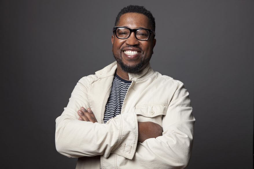 This image released by W.W. Norton shows poet Major Jackson. Jackson says that he and his wife and fellow poet, Didi Jackson, committed themselves to writing every day once they began sheltering in place, a way of distracting themselves from current events but also to absorb them. (Erin Patrice O'Brien/W.W. Norton via AP)