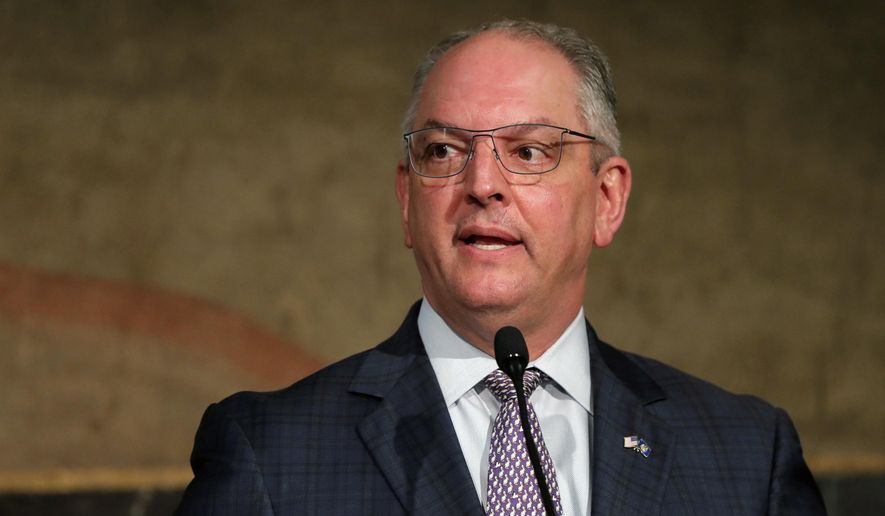 Louisiana Gov. John Bel Edwards speaks to reporters at a briefing on the state&#39;s efforts against the coronavirus pandemic in Baton Rouge, La., Monday, May 4, 2020. (AP Photo/Gerald Herbert)