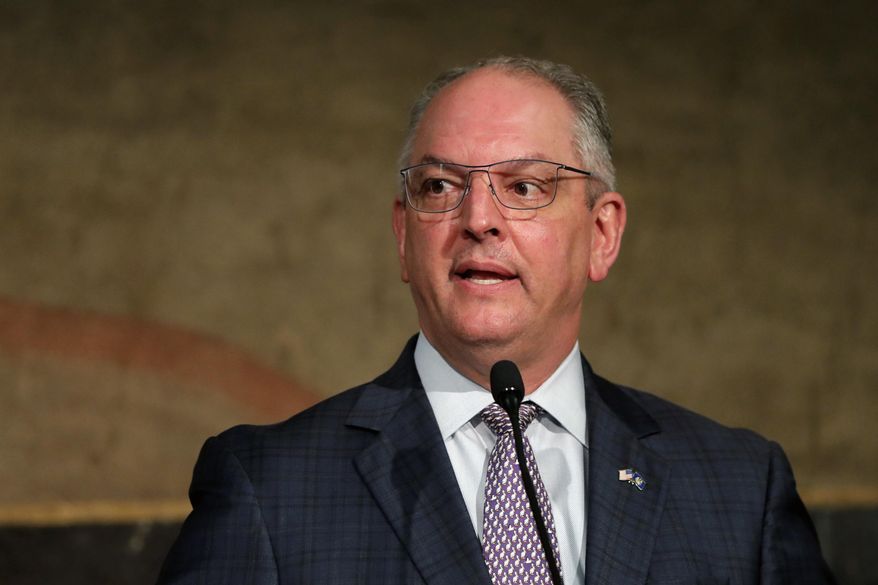 Louisiana Gov. John Bel Edwards speaks to reporters at a briefing on the state&#39;s efforts against the coronavirus pandemic in Baton Rouge, La., Monday, May 4, 2020. (AP Photo/Gerald Herbert)
