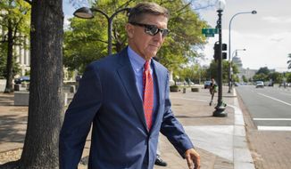 In this Sept. 10, 2019, file photo, Michael Flynn, President Donald Trump&#39;s former national security adviser, leaves the federal court following a status conference in Washington. (AP Photo/Manuel Balce Ceneta) ** FILE **
