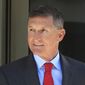 In this July 10, 2018, file photo, former Trump National Security Adviser Michael Flynn leaves the federal courthouse in Washington, following a status hearing. (AP Photo/Manuel Balce Ceneta, File)