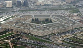 This March 27, 2008, file photo shows the Pentagon in Arlington, Va.  (AP Photo/Charles Dharapak, File) ** FILE **