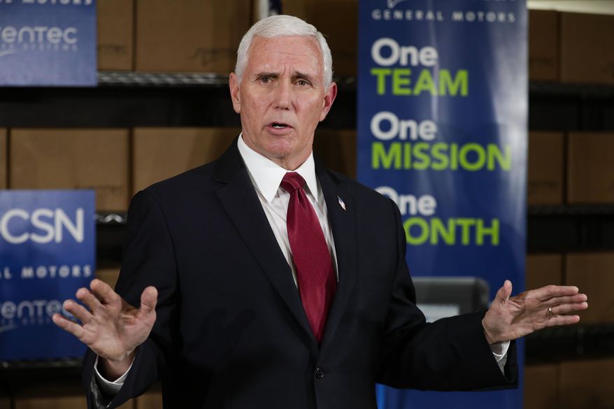 Vice President Mike Pence takes questions following a visits to the General Motors/Ventec ventilator production facility in Kokomo, Ind., Thursday, April 30, 2020. (AP Photo/Michael Conroy)
