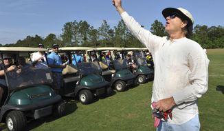 FILE - In this April 22, 2016, filer photo, actor Bill Murray dedicates the annual Caddyshack Golf Tournament to  singer-songwriter Prince, at the start of the golf tournament at King and Bear golf course in St. Augustine, Fla. &amp;quot;Caddyshack&amp;quot; starring Murray was No. 4 in The Associated Press’ Top 25 favorite sports movies poll. (Will Dickey/The Florida Times-Union via AP, File)