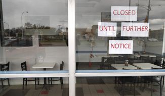 Vasi&#39;s Cafe is shown closed in St. Clair Shores, Mich., Friday, May 8, 2020. Many restaurants have closed due to the coronavirus pandemic. (AP Photo/Paul Sancya)