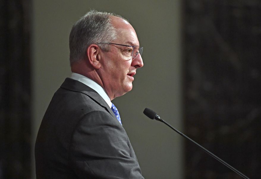 Louisiana Gov. John Bel Edwards speaks at a news conference to discuss testing statistics and contact tracing pertaining to COVID-10, Friday, May 8, 2020, at the State Capitol in Baton Rouge, La. (Hilary Scheinuk/The Advocate via AP)