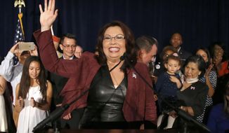 Tammy Duckworth, D-Ill., celebrates her win during her election night party n Chicago.  (AP Photo/Charles Rex Arbogast)