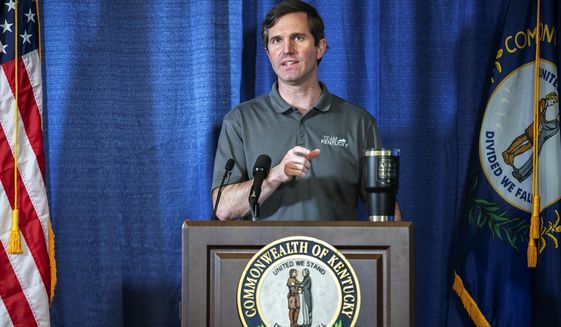 In this Sunday, May 3, 2020, file photo, Kentucky Gov. Andy Beshear speaks during a news conference at the state&#x27;s Emergency Operations Center at the Boone National Guard Center in Frankfort, Ky., about the coronavirus pandemic.  (Ryan C. Hermens/Lexington Herald-Leader via AP) **FILE**