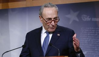 In this April 21, 2020, file photo, Senate Minority Leader Sen. Chuck Schumer of N.Y., speaks with reporters on Capitol Hill in Washington. (AP Photo/Patrick Semansky) ** FILE **