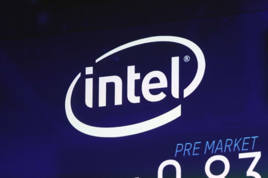In this Oct. 3, 2018, file photo the Intel logo appears on a screen at the Nasdaq MarketSite, in New York&#39;s Times Square. (AP Photo/Richard Drew, File)