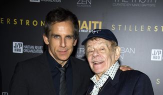 In this Feb. 11, 2011, photo, Ben Stiller, left, and his father Jerry Stiller arrive at the Help Haiti benefit honoring Sean Penn hosted by the Stiller Foundation and The J/P Haitian Relief Organization, in New York. Comedian veteran Jerry Stiller, who launched his career opposite wife Anne Meara in the 1950s and reemerged four decades later as the hysterically high-strung Frank Costanza on the smash television show “Seinfeld,” died at 92, his son Ben Stiller announced Monday. (AP Photo/Charles Sykes, File)
