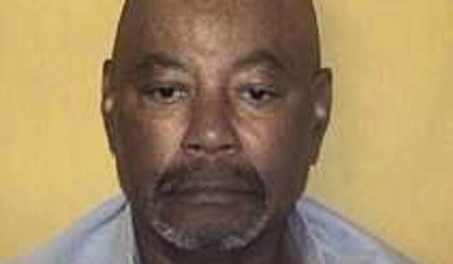 This undated photo provided by the Ohio Department of Rehabilitation and Corrections shows Carlos Ridley. Ridley, serving a life sentence for a triple slaying, was awaiting a court ruling this month he hoped would help him prove innocence through DNA testing. On Monday, May 4, 2020, an Ohio appeals court rejected Ridley's request. The next day, he was rushed to a hospital where he died of COVID-19, according to his two daughters. (Ohio Department of Corrections via AP)