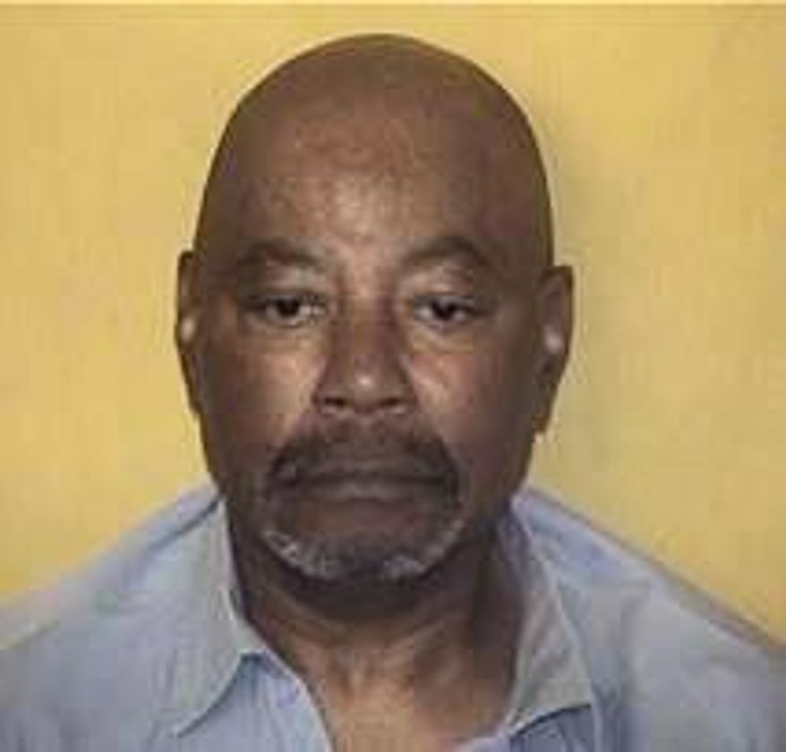 This undated photo provided by the Ohio Department of Rehabilitation and Corrections shows Carlos Ridley. Ridley, serving a life sentence for a triple slaying, was awaiting a court ruling this month he hoped would help him prove innocence through DNA testing. On Monday, May 4, 2020, an Ohio appeals court rejected Ridley's request. The next day, he was rushed to a hospital where he died of COVID-19, according to his two daughters. (Ohio Department of Corrections via AP)
