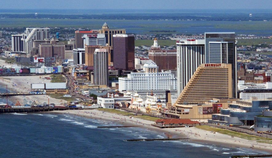 This July 11, 2014 aerial photo shows the shoreline in Atlantic City, N.J. The city&#x27;s voters will decide on May 12, 2020, whether to eliminate an elected mayor in favor of an appointed city manager. (AP Photo/Wayne Parry)