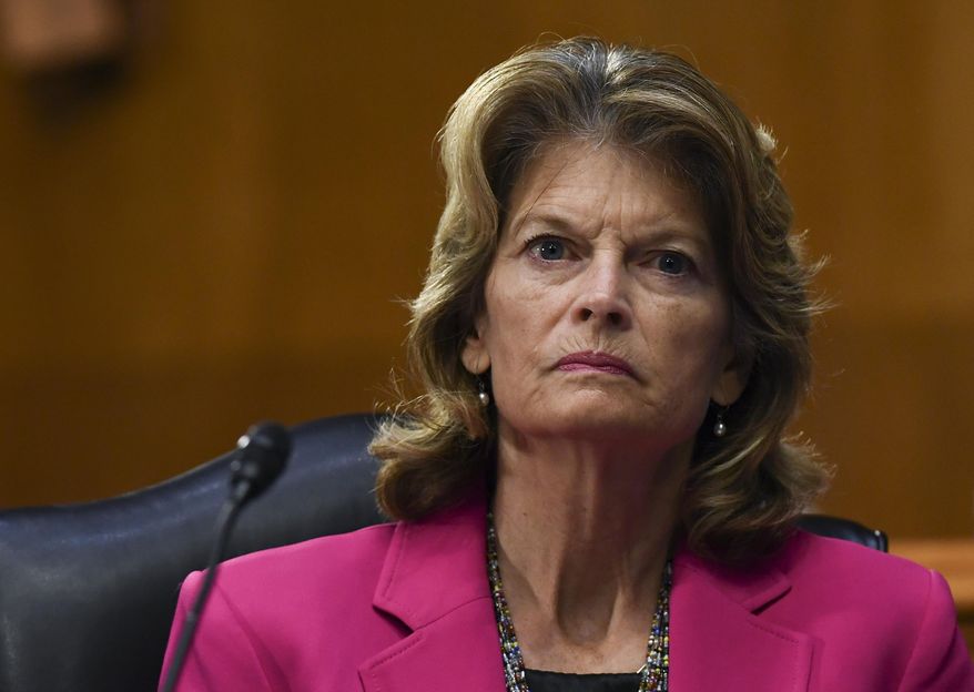 Sen. Lisa Murkowski, R-Alaska, listens to testimony by Dr. Anthony Fauci, director of the National Institute of Allergy and Infectious Diseases, before the Senate Committee for Health, Education, Labor, and Pensions hearing, Tuesday, May 12, 2020, on Capitol Hill in Washington. (Toni L. Sandys/The Washington Post via AP, Pool) ** FILE **